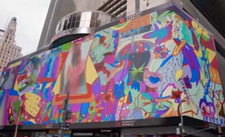 A building covered with a large, colorful mural featuring abstract shapes, vibrant patterns, and whimsical characters, set on a busy city street with tall skyscrapers in the background.