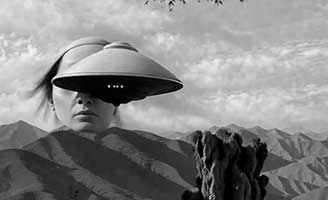 A surreal black-and-white image showing a womans face partially merged with a flying saucer hovering above a mountainous landscape, blending her features with the scenery beneath a cloudy sky.